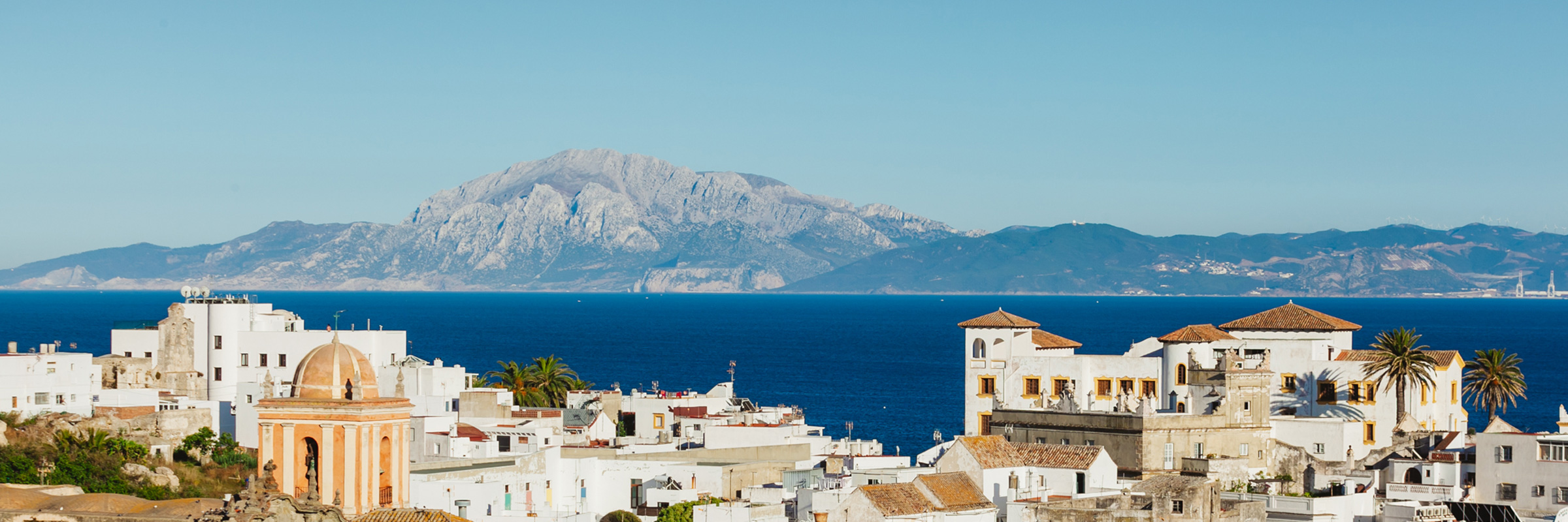 Views of the roofs of Tarifa with Morocco in the background