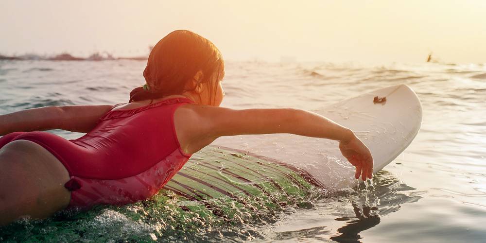 Niña en Tabla de surf